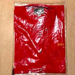 Ferrari Quebec short sleeve shirt. Brand new in packaging. Size Large .
